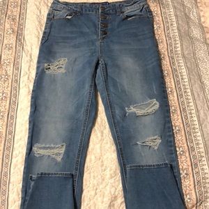 Blue skinny jeans, four buttons